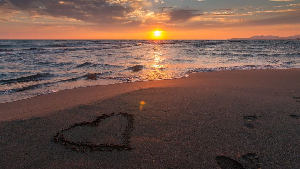 Heart in the sand at beach- Serendipity Anna Maria